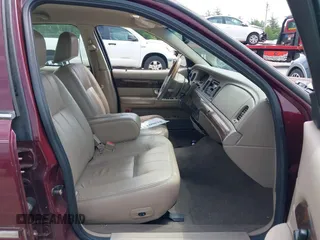 2005 Mercury Grand Marquis LS Premium z VIN 2MEHM75W05X636003, wystawiony jako IAAI lot #42480277 z przebiegiem 224 789 mil mil oraz . Historia ofert i sprzedaży dostępna na DreamBid. Obrazek 5.