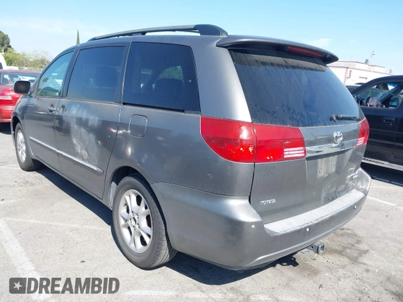 2005 Toyota Sienna XLE with VIN 5TDZA22C55S296645, listed as a IAAI auction lot 42017952 with 238,212 mi miles and . Bid and sale history available at DreamBid. Image 3.