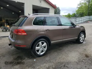 2013 Volkswagen Touareg Exec с VIN WVGEF9BP4DD007109, выставлен на аукционе Copart как лот 58890665 с пробегом 157 286 миль миль и Списание • Salvage title. История ставок и продаж доступна на DreamBid. Изображение 3.