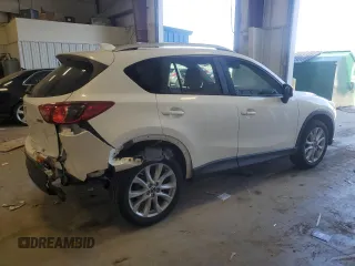 2015 Mazda CX-5 Grand Touring with VIN JM3KE4DY5F0538016, listed as a Copart auction lot 52396685 with 137,272 mi miles and Clean Title. Bid and sale history available at carsss.com. Image 3.