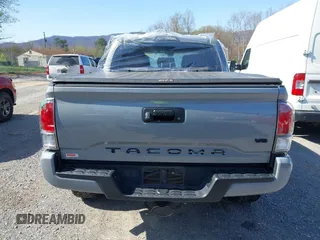 2020 Toyota Tacoma SR5 z VIN 5TFCZ5AN5LX229019, wystawiony jako IAAI lot #41907694 z przebiegiem 79 355 mil mil oraz . Historia ofert i sprzedaży dostępna na DreamBid. Obrazek 17.