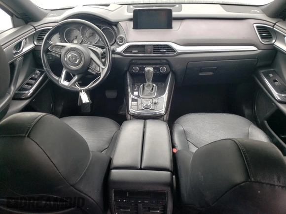 2017 Mazda CX-9 Grand Touring z VIN JM3TCADY3H0140573, wystawiony jako Copart lot #60513145 z przebiegiem 97 793 mil mil oraz Czysty tytuł • Clean title. Historia ofert i sprzedaży dostępna na DreamBid. Obrazek 8.