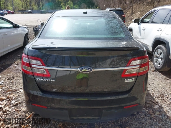 2014 Ford Taurus SHO with VIN 1FAHP2KT8EG131067, listed as a IAAI auction lot 42102086 with 107,822 mi miles. Bid and sale history available at carsss.com. Image 16.