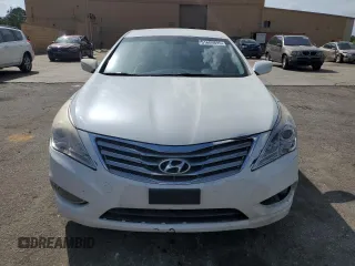 2014 Hyundai Azera с VIN KMHFG4JG0EA352016, выставлен на аукционе Copart как лот 51609895 с пробегом 186 157 миль миль и Чистый • Clean title. История ставок и продаж доступна на DreamBid. Изображение 5.