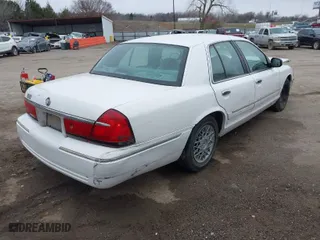 2001 Mercury Grand Marquis GS with VIN 2MEFM74W81X612809, listed as a IAAI auction lot 41697200 with 160,423 mi miles. Bid and sale history available at carsss.com. Image 4.