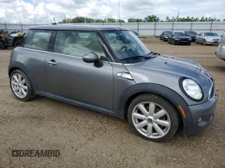 2008 MINI Hardtop S with VIN WMWMF73538TT91152, listed as a Copart auction lot 57671495 with 176,063 mi miles and Salvage title. Bid and sale history available at DreamBid. Image 4.