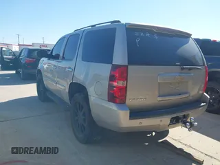 2007 Chevrolet Tahoe LT z VIN 1GNFC13077R105182, wystawiony jako IAAI lot #41649825 z przebiegiem Nie podano mil oraz . Historia ofert i sprzedaży dostępna na DreamBid. Obrazek 3.