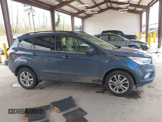 2018 Ford Escape SEL with VIN 1FMCU0HD1JUC04403, listed as a IAAI auction lot 41993351 with 91,880 mi miles and . Bid and sale history available at carsss.com. Image 14.