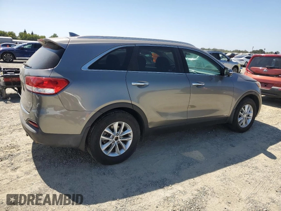 2017 Kia Sorento LX z VIN 5XYPGDA30HG272967, wystawiony jako Copart lot #61288475 z przebiegiem 74 770 mil mil oraz Czysty tytuł • Clean title. Historia ofert i sprzedaży dostępna na DreamBid. Obrazek 3.