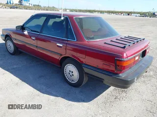 1989 Toyota Camry DLX с VIN 4T1SV21E9KU059104, выставлен на аукционе IAAI как лот 41014925 с пробегом 312 844 миль миль и . История ставок и продаж доступна на DreamBid. Изображение 3.