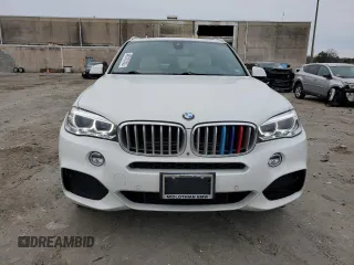 2018 BMW X5 xDrive40e iPerformance with VIN 5UXKT0C57J0V98823, listed as a Copart auction lot 48310145 with 92,985 mi miles and Clean Title. Bid and sale history available at carsss.com. Image 5.