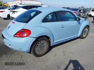 2013 Volkswagen Beetle with VIN 3VWHX7AT4DM667136, listed as a IAAI auction lot 41855778 with 120,300 mi miles and . Bid and sale history available at DreamBid. Image 4.