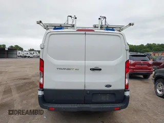 2018 Ford Transit z VIN 1FTYE1ZM2JKB56191, wystawiony jako IAAI lot #42538736 z przebiegiem 204 436 mil mil oraz . Historia ofert i sprzedaży dostępna na DreamBid. Obrazek 16.