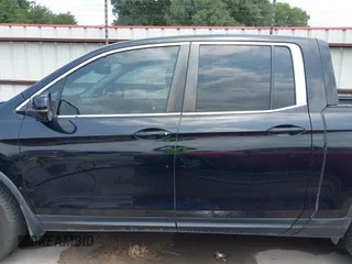 2017 Honda Ridgeline RTL z VIN 5FPYK2F55HB011463, wystawiony jako IAAI lot #42139030 z przebiegiem 59 066 mil mil oraz . Historia ofert i sprzedaży dostępna na DreamBid. Obrazek 15.