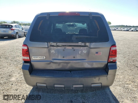 2009 Ford Escape XLS z VIN 1FMCU02729KA14846, wystawiony jako Copart lot #61658205 z przebiegiem 239 852 mil mil oraz Czysty tytuł • Clean title. Historia ofert i sprzedaży dostępna na DreamBid. Obrazek 6.