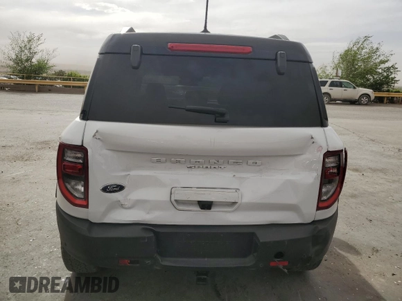 2021 Ford Bronco Sport Badlands z VIN 3FMCR9D96MRA87307, wystawiony jako Copart lot #53701625 z przebiegiem 27 744 mil mil oraz Szkoda całkowita • Salvage title. Historia ofert i sprzedaży dostępna na DreamBid. Obrazek 6.