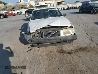 1994 Volvo 900 z VIN YV1JS8611R1172830, wystawiony jako Copart lot #75955284 z przebiegiem 222 846 mil mil oraz Szkody całkowita. Historia ofert i sprzedaży dostępna na DreamBid. Obrazek 5.