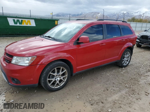 2013 Dodge Journey R/T with VIN 3C4PDDEG1DT595269, listed as a Copart auction lot 79164814 with 203,524 mi miles and Salvage title. Bid and sale history available at DreamBid. Image 1.