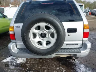 2001 Honda Passport LX z VIN 4S6CK58W014401073, wystawiony jako IAAI lot #41380551 z przebiegiem 259 878 mil mil oraz . Historia ofert i sprzedaży dostępna na DreamBid. Obrazek 16.