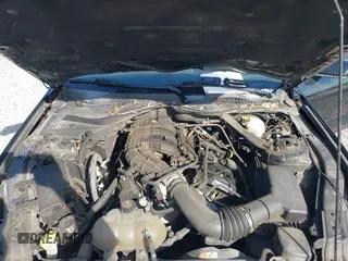 2015 Ford Mustang V6 with VIN 1FATP8EM6F5427266, listed as a IAAI auction lot 42003599 with 120,222 mi miles and . Bid and sale history available at DreamBid. Image 10.