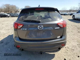2014 Mazda CX-5 Touring with VIN JM3KE2CY0E0322059, listed as a Copart auction lot 48091805 with 212,889 mi miles and Salvage Title. Bid and sale history available at carsss.com. Image 6.
