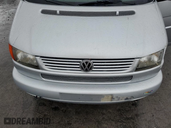 2003 Volkswagen EuroVan с VIN WV2KB47093H041606, выставлен на аукционе Copart как лот 73808224 с пробегом 228 496 миль миль и Чистый • Clean title. История ставок и продаж доступна на DreamBid. Изображение 12.