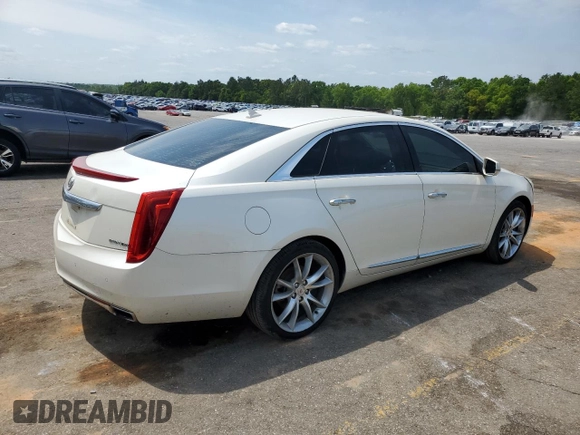 2014 Cadillac XTS Luxury z VIN 2G61M5S38E9215641, wystawiony jako Copart lot #53188695 z przebiegiem 97 431 mil mil oraz Szkody całkowita. Historia ofert i sprzedaży dostępna na DreamBid. Obrazek 3.