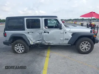 2023 Jeep Wrangler Sport S with VIN 1C4HJXDNXPW702199, listed as a IAAI auction lot 41859413 with 24,942 mi miles and . Bid and sale history available at DreamBid. Image 13.