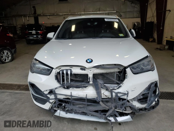 2020 BMW X1 xDrive28i z VIN WBXJG9C00L5P42487, wystawiony jako Copart lot #59669325 z przebiegiem 88 402 mil mil oraz Szkoda całkowita • Salvage title. Historia ofert i sprzedaży dostępna na DreamBid. Obrazek 5.