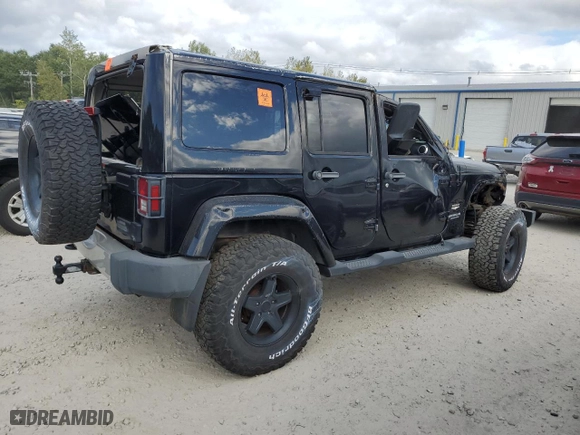 2011 Jeep Wrangler Unlimited Sahara with VIN 1J4HA5H19BL623123, listed as a Copart auction lot 72860734 with 0 mi miles and Non Repairable. Bid and sale history available at carsss.com. Image 3.