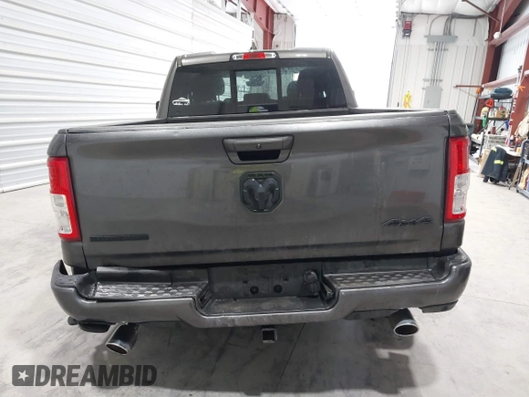 2021 Ram 1500 Big Horn z VIN 1C6SRFBT8MN696504, wystawiony jako IAAI lot #41669093 z przebiegiem 63 356 mil mil oraz . Historia ofert i sprzedaży dostępna na DreamBid. Obrazek 16.