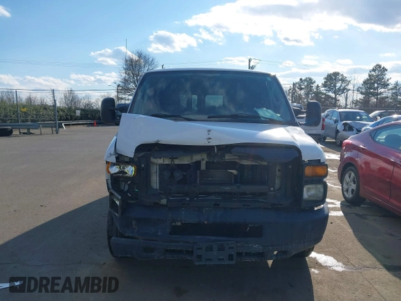 2012 Ford Econoline Cargo Commercial with VIN 1FTNE1EW4CDB18138, listed as a IAAI auction lot 41416843 with 285,734 mi miles and . Bid and sale history available at carsss.com. Image 12.