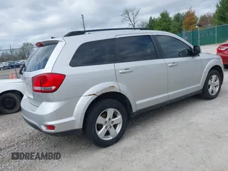 2012 Dodge Journey SXT z VIN 3C4PDDBG2CT249377, wystawiony jako IAAI lot #41948616 z przebiegiem 220 033 mil mil oraz . Historia ofert i sprzedaży dostępna na DreamBid. Obrazek 4.