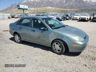 2004 Ford Focus SE with VIN 1FAFP34334W178697, listed as a Copart auction lot 53195525 with 139,932 mi miles and Salvage title. Bid and sale history available at DreamBid. Image 4.