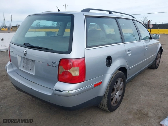 2003 Volkswagen Passat GLX with VIN WVWYH63B73E462624, listed as a IAAI auction lot 41555785 with 166,521 mi miles. Bid and sale history available at carsss.com. Image 4.