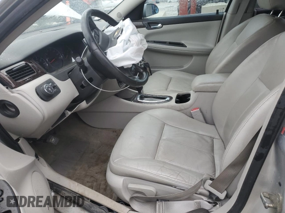 2014 Chevrolet Impala LTZ with VIN 2G1WC5E33E1166602, listed as a Copart auction lot 52108575 with 124,477 mi miles and Clean Title. Bid and sale history available at DreamBid. Image 7.