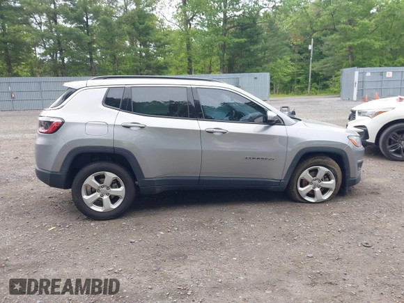 2021 Jeep Compass Latitude with VIN 3C4NJDBBXMT569861, listed as a IAAI auction lot 42325006 with 83,153 mi miles and . Bid and sale history available at DreamBid. Image 13.