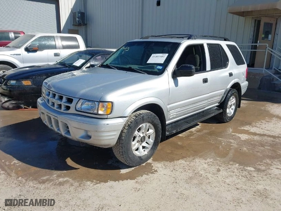 2002 Isuzu Rodeo S with VIN 4S2CK58WX24321556, listed as a IAAI auction lot 41405981 with 172,590 mi miles. Bid and sale history available at carsss.com. Image 2.