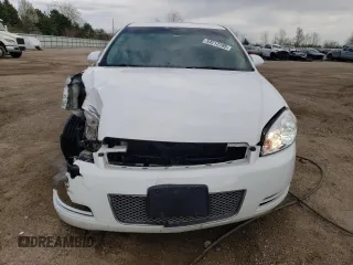 2014 Chevrolet Impala LT with VIN 2G1WB5E31E1154130, listed as a Copart auction lot 54212785 with 150,169 mi miles and Salvage title. Bid and sale history available at DreamBid. Image 5.