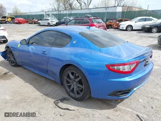 2013 Maserati GranTurismo Sport with VIN ZAM45VLA7D0073503, listed as a IAAI auction lot 41921102 with 53,436 mi miles. Bid and sale history available at carsss.com. Image 3.