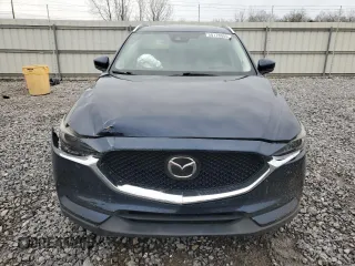2017 Mazda CX-5 Grand Touring with VIN JM3KFADL3H0125143, listed as a Copart auction lot 50178005 with 160,058 mi miles and Salvage Title. Bid and sale history available at carsss.com. Image 5.