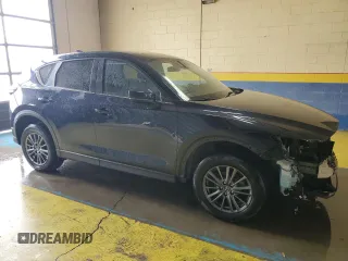 2021 Mazda CX-5 Touring with VIN JM3KFACMXM0334139, listed as a Copart auction lot 55362905 with 117,279 mi miles and Clean Title. Bid and sale history available at DreamBid. Image 4.