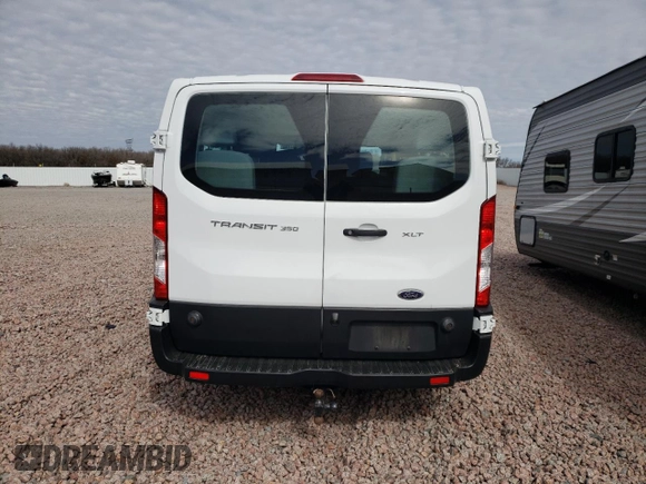 2019 Ford Transit Passenger XL z VIN 1FBZX2ZM4KKB24336, wystawiony jako Copart lot #49377135 z przebiegiem 58 994 mil mil oraz Szkody całkowita. Historia ofert i sprzedaży dostępna na DreamBid. Obrazek 6.