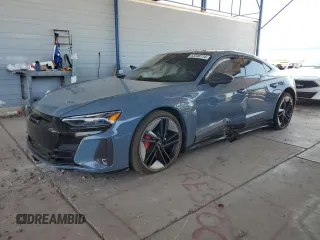 2022 Audi RS e-tron GT z VIN WAUAHBFW0N7902258, wystawiony jako Copart lot #63346114 z przebiegiem Nie podano mil oraz Szkody całkowita. Historia ofert i sprzedaży dostępna na DreamBid. Obrazek 1.
