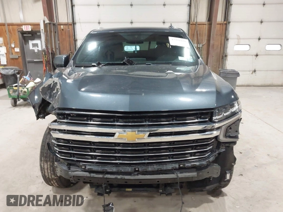 2021 Chevrolet Tahoe LT z VIN 1GNSKNKD5MR354265, wystawiony jako IAAI lot #42331890 z przebiegiem 106 250 mil mil oraz . Historia ofert i sprzedaży dostępna na DreamBid. Obrazek 13.