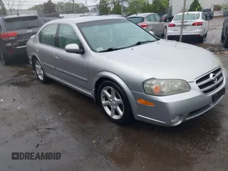 2003 Nissan Maxima SE z VIN JN1DA31D23T515444, wystawiony jako IAAI lot #42243352 z przebiegiem 134 741 mil mil oraz . Historia ofert i sprzedaży dostępna na DreamBid. Obrazek 1.