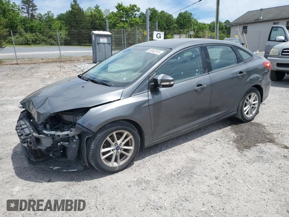 2017 Ford Focus SE with VIN 1FADP3F2XHL201380, listed as a Copart auction lot 56942815 with 136,169 mi miles and Salvage title. Bid and sale history available at DreamBid. Image 1.