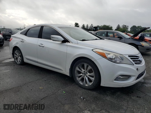 2013 Hyundai Azera с VIN KMHFG4JG8DA228669, выставлен на аукционе Copart как лот 62734185 с пробегом 148 611 миль миль и Чистый • Clean title. История ставок и продаж доступна на DreamBid. Изображение 4.