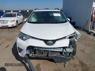 2018 Toyota RAV4 XLE with VIN JTMWFREV7JJ728184, listed as a IAAI auction lot 41377413 with 117,957 mi miles. Bid and sale history available at carsss.com. Image 11.