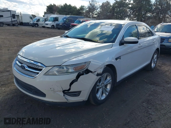 2014 Ford Taurus SEL with VIN 1FAHP2E88EG127074, listed as a IAAI auction lot 41688975 with 186,650 mi miles. Bid and sale history available at carsss.com. Image 2.